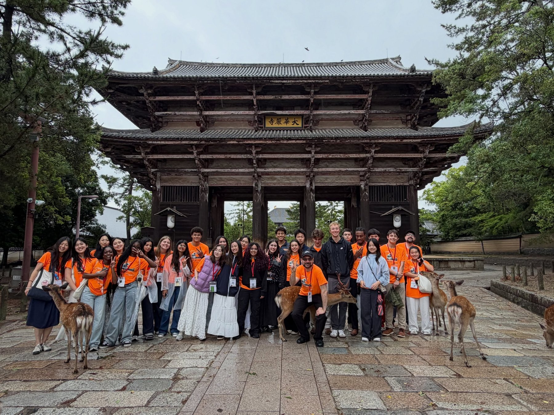 With classmates at a temple gate in Nara, Japan