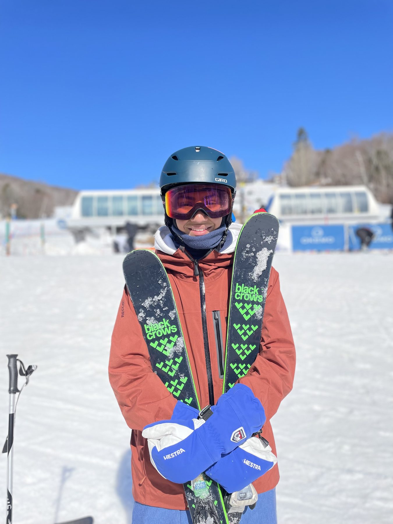 Me holding my skis before a run