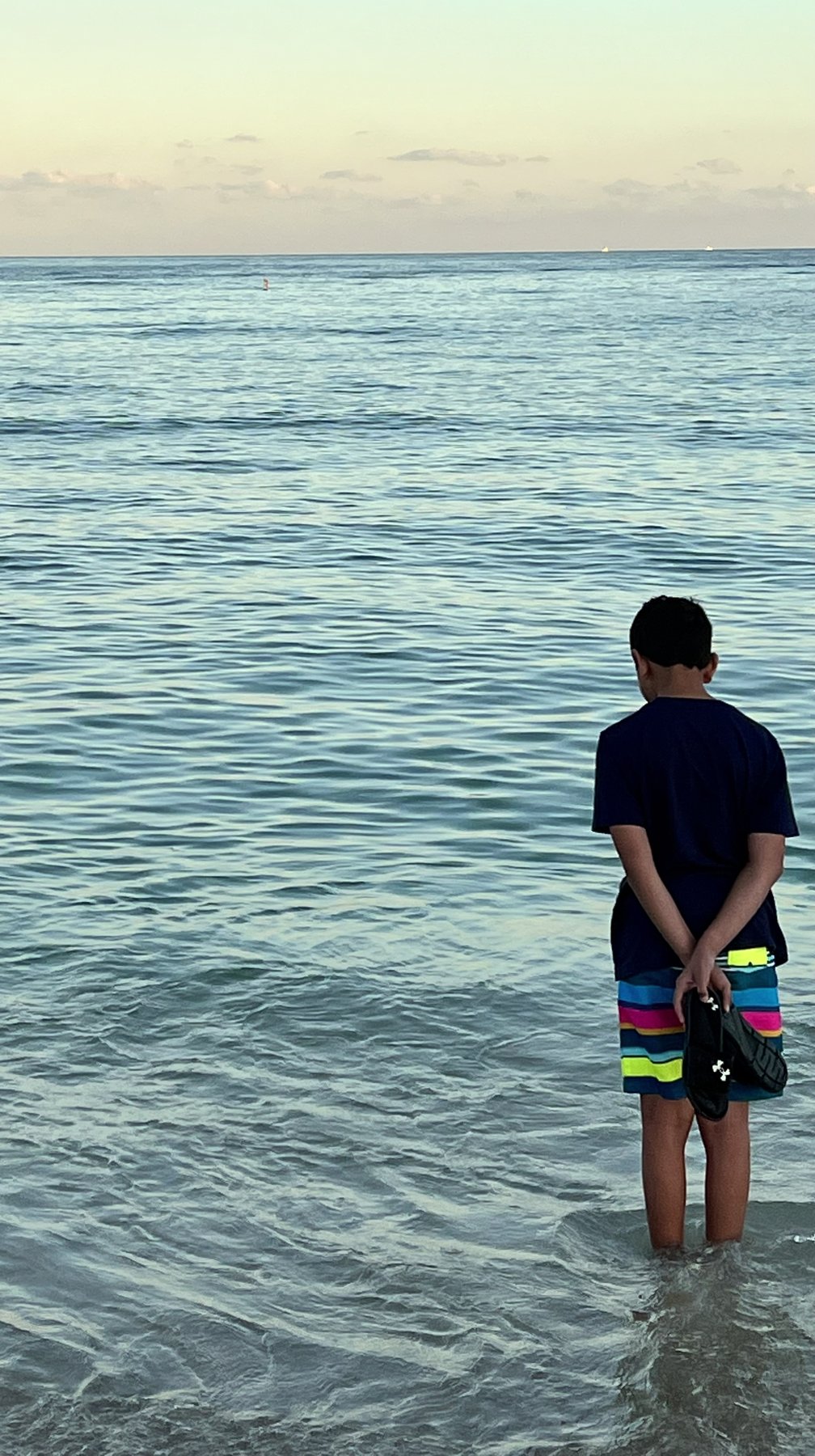 Me standing in the ocean at dusk